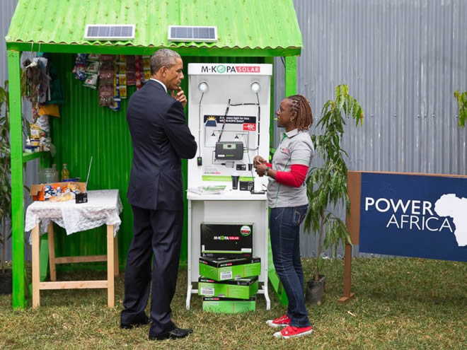 President Barack Obama looks at a solar power exhibit during a tour of the Power Africa Innovation Fair, Saturday, July 25, 2015, in Nairobi.