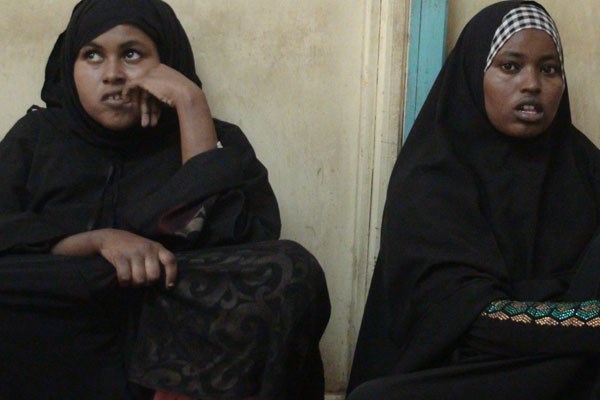 Ms Ubah Abdirahaman Hassan and Ms Fadumo Anshur Mohamed at a Mandera court. The two women, together with two men, all of Somali origin, were fined Sh 5.5 million for obtaining Kenyan visas illegally and being in Kenya unlawfully. PHOTO | MANASE OTSIALO