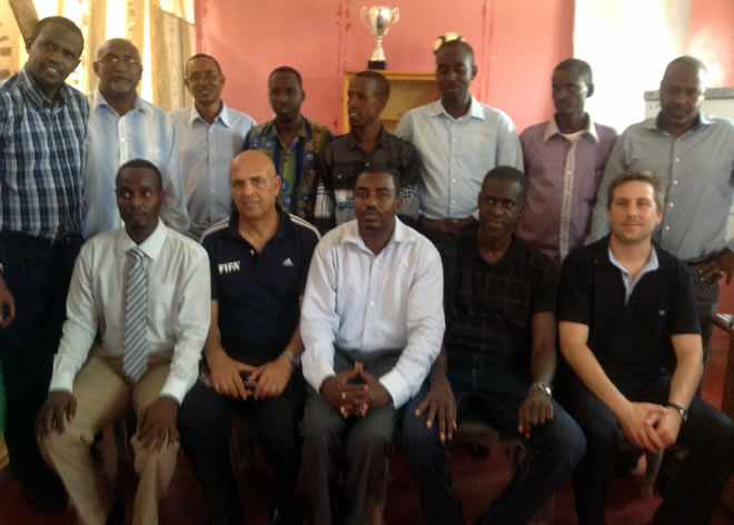 President Souleiman Middle in the front row with FIFA officials as FDF executive committee members stand in the back row.jpg