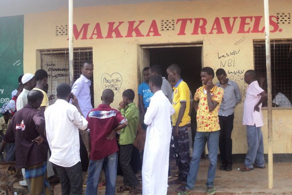 Relatives of those believed to have travelled in the bus that was attacked by Al-Shabaab militia outside the Makkah bus offices in Mandera. | MANASE OTSIALO | NATION MEDIA GROUP