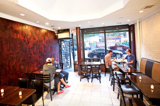 One wall is covered in the graceful hooks and curls of the Osmanya alphabet, invented in 1920 for transcribing the Somali language, as an indigenous alternative to Arabic script.