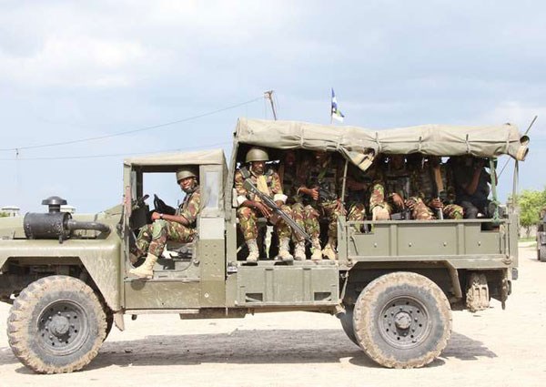 Kenya Defence forces under Africa Union Mission in Somalia (Amisom) soldiers during patrol in Afmadow Town, Somalia on November 22, 2015. Amisom will likely remain unable to achieve its objectives until Somali national forces become far more effective in securing the country against Islamist insurgents, a new study concludes. PHOTO | JEFF ANGOTE