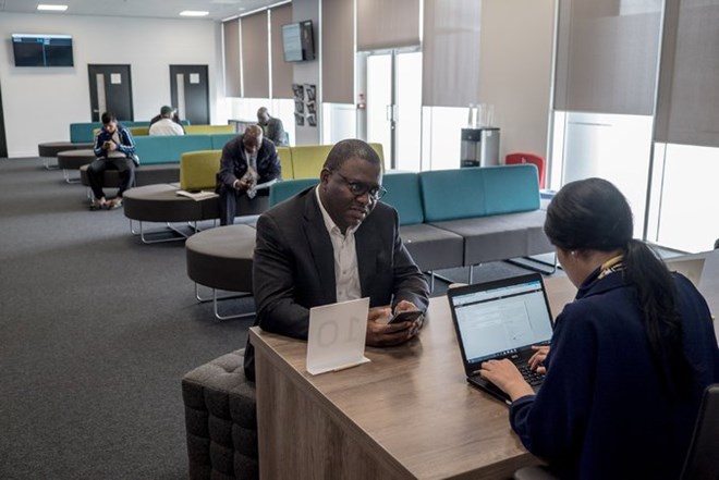 Prospective drivers waiting to be seen by representatives at the Uber Hub. The presence of Uber’s 40,000 overwhelmingly nonwhite drivers on London’s streets has sharpened racial divisions in the working class at a time when incomes at the bottom are being squeezed.