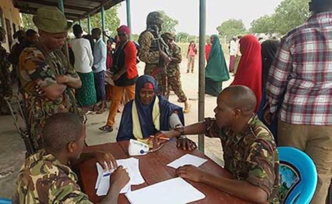 KDF medical personnel treat residents of Kotile which is within the Linda Boni operation zone. Most hospitals in the area have been closed down due to persistent Al-Shabaab attacks. PHOTO | KALUME KAZUNGU | NATION MEDIA GROUP