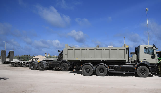 David Concar, the UK Ambassador to Somalia hands over vehicles donated by the UK Government to Lt. Gen. Jim Beesigye Owoyesigire, the African Union Mission in Somalia (AMISOM) Force Commander during a ceremony held in Mogadishu on June 30, 2018. AMISOM Photo / Ilyas Ahmed