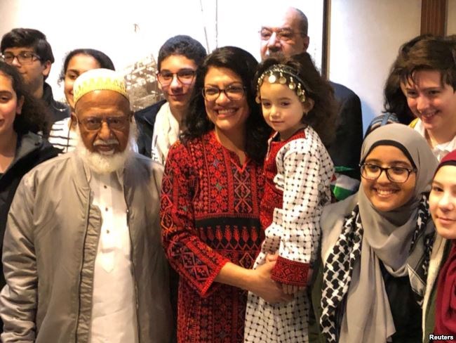 Congresswoman Rashida Tlaib (D-MI), the first Palestinian-American elected to the House, poses with supporters outside her office at the Longworth House Office Building (LHOB), in Washington, D.C., Jan. 3, 2019.